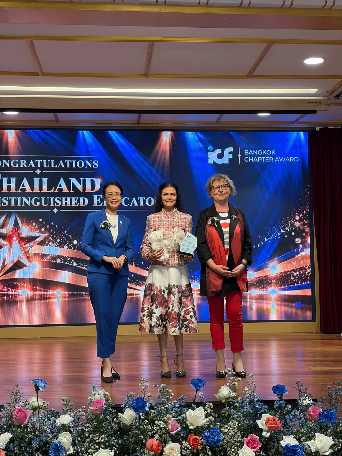 Lux Hettiyadura receiving her award at the ICF Bangkok Chapter Awards 2026